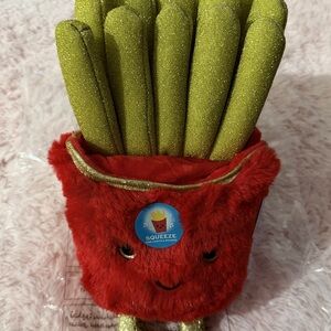 GLAMGLOW Red and Gold Plush Toy